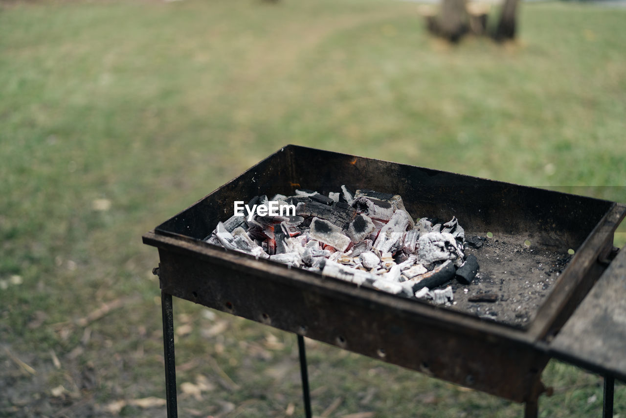 nature, grass, no people, day, barbecue grill, barbecue, burning, focus on foreground, food, food and drink, outdoors, fire, outdoor grill, coal, plant