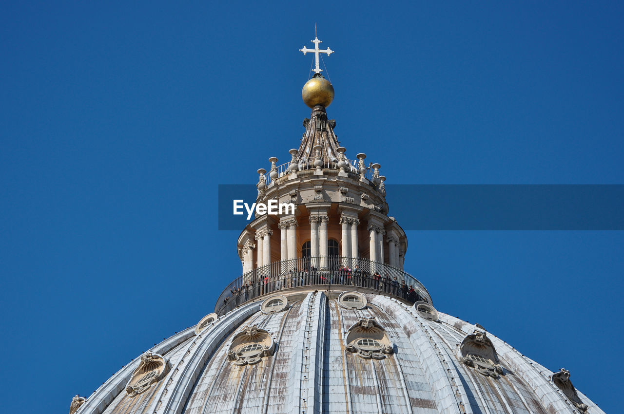 Tourists visiting the cupola of the saint peter's basilica in vatican city 