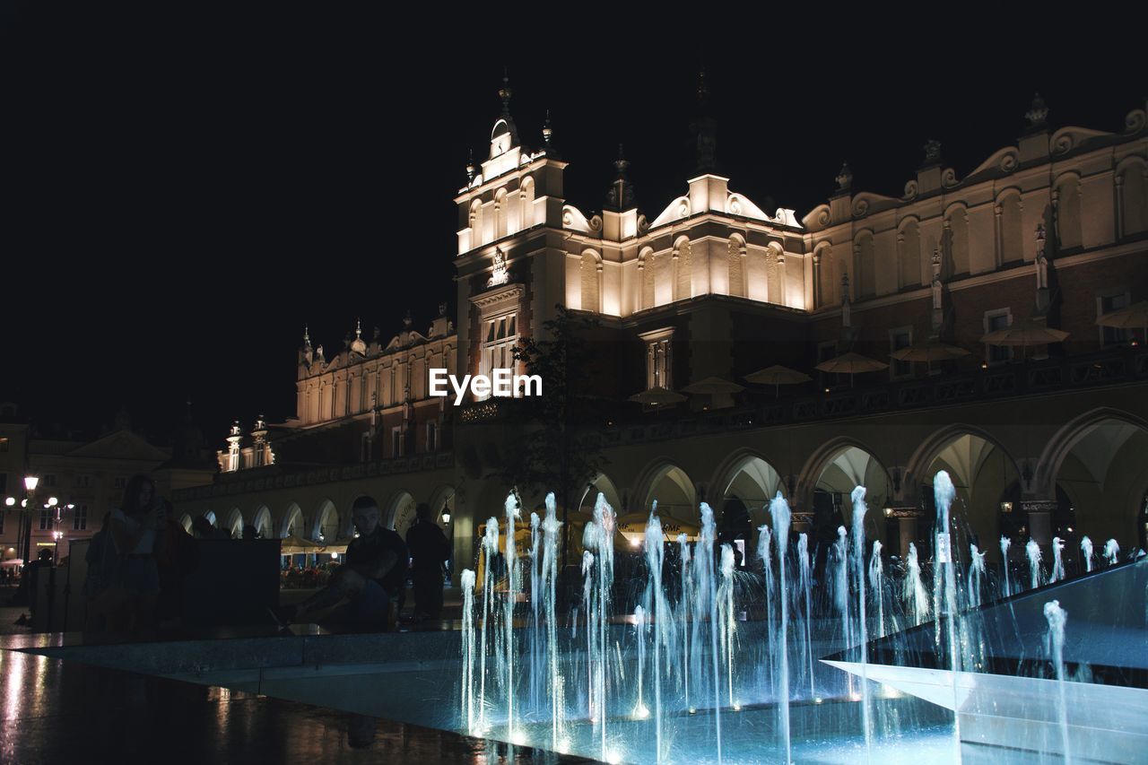 ILLUMINATED BUILDING AT NIGHT