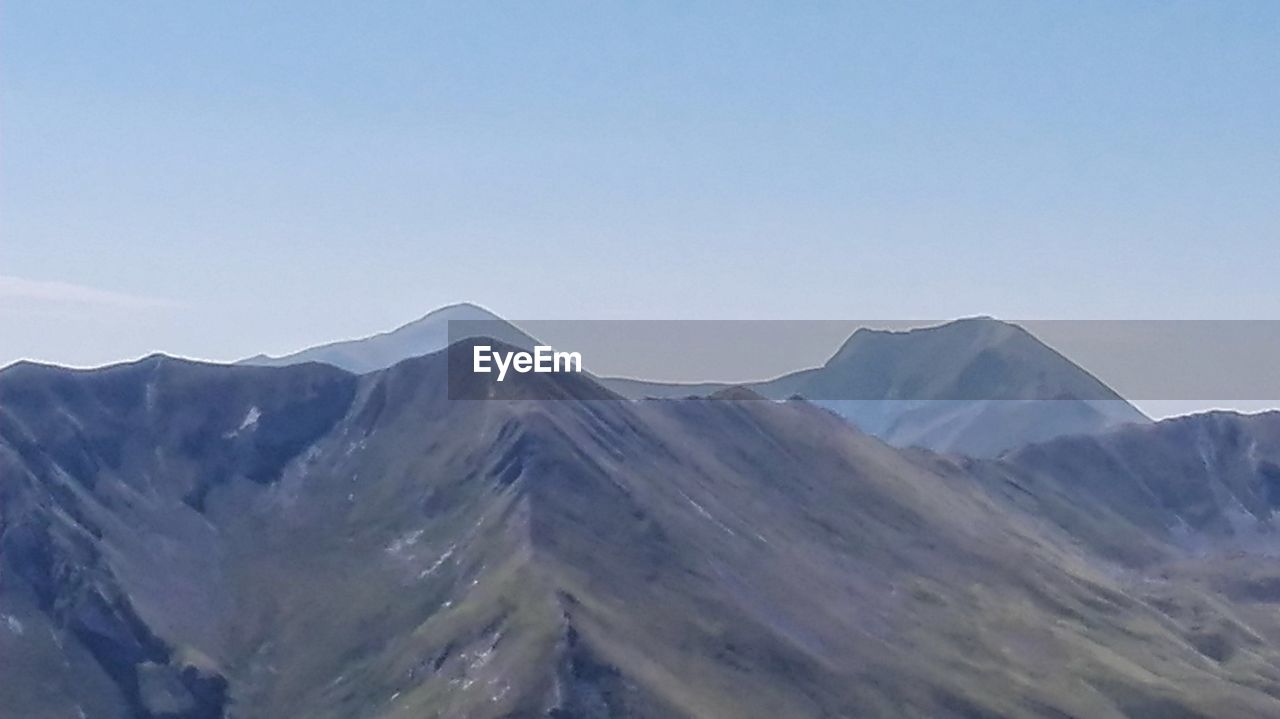 SCENIC VIEW OF SNOWCAPPED MOUNTAINS