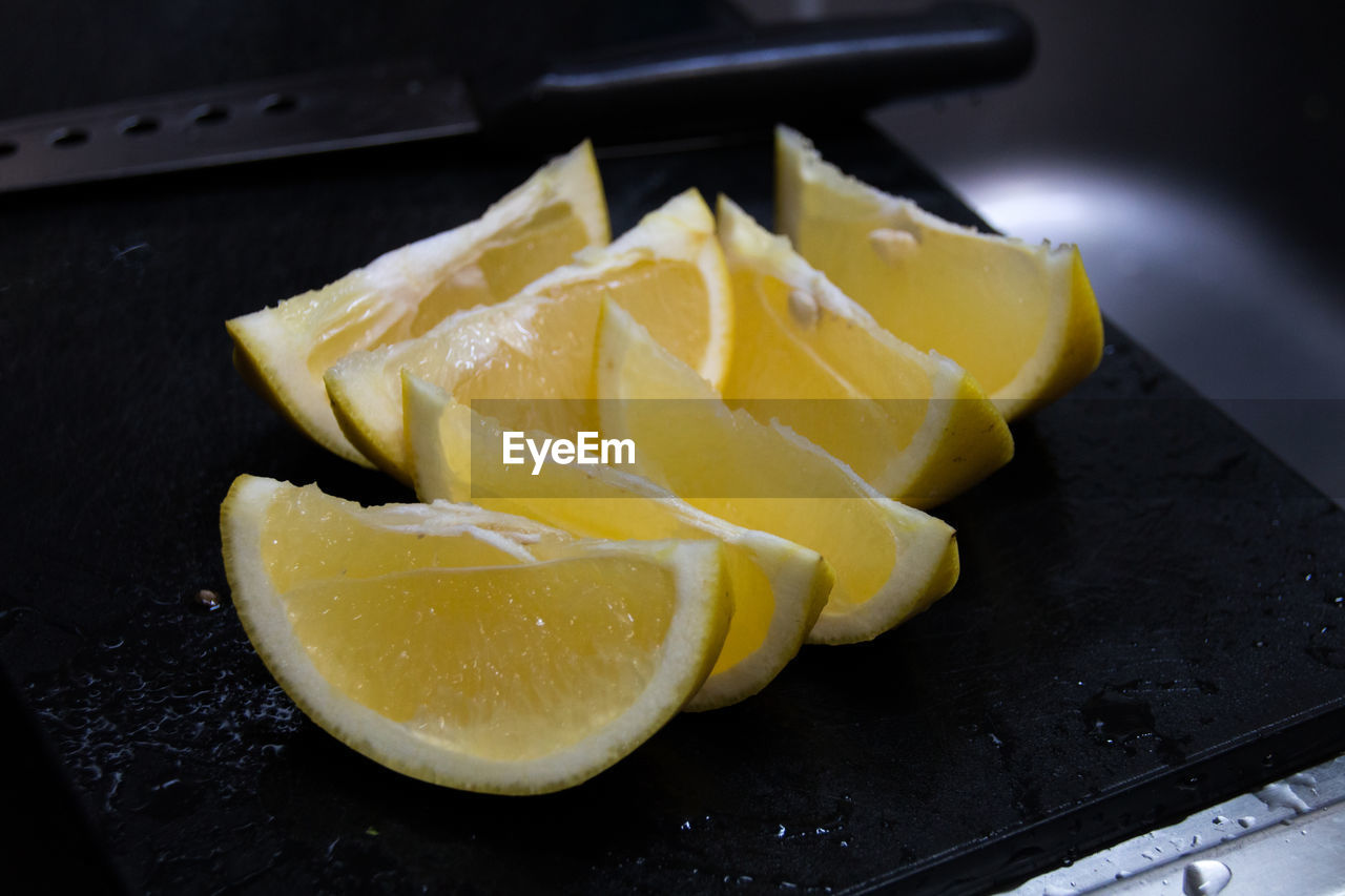 Close-up of sliced lemons on table