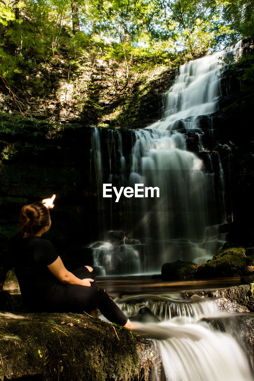 SCENIC VIEW OF WATERFALL