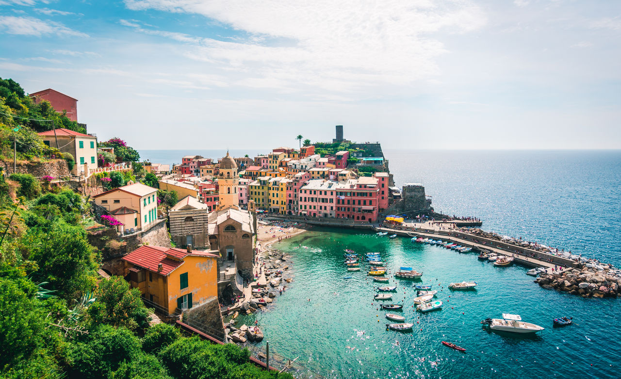 Scenic view of ocean and harbor in colorful village vernazza, cinque terre, italy