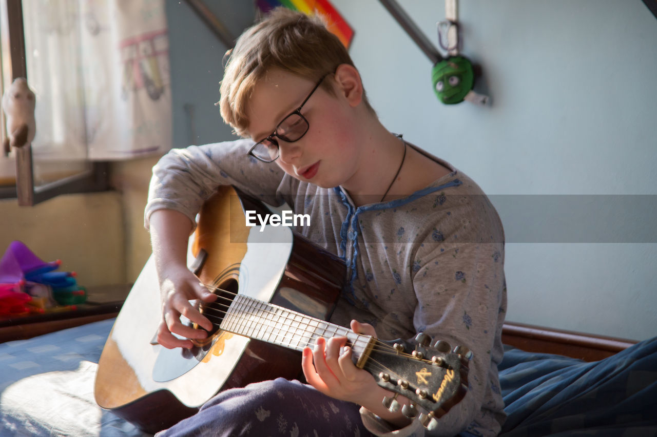 Young man playing guitar