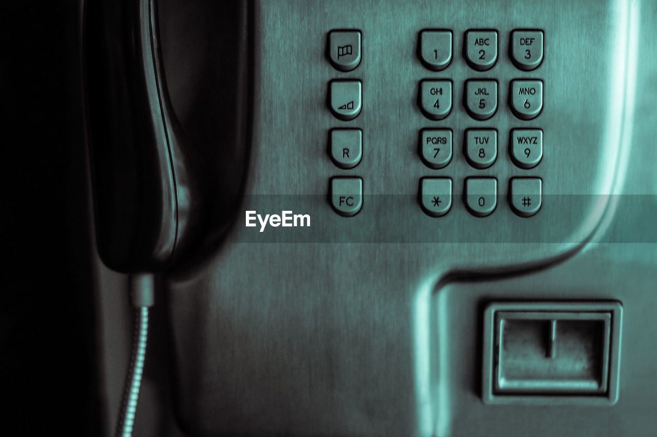 Close-up of pay phone