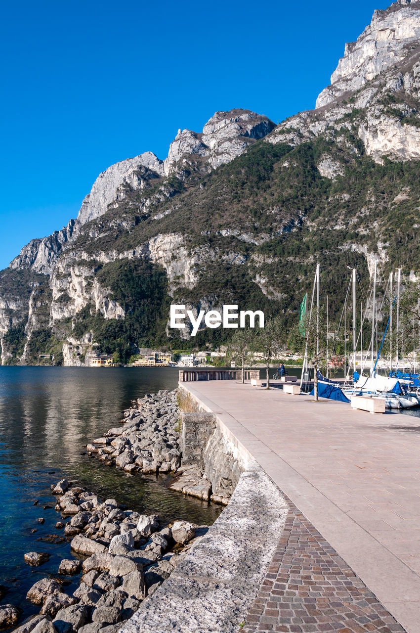 SCENIC VIEW OF MOUNTAINS AGAINST CLEAR SKY