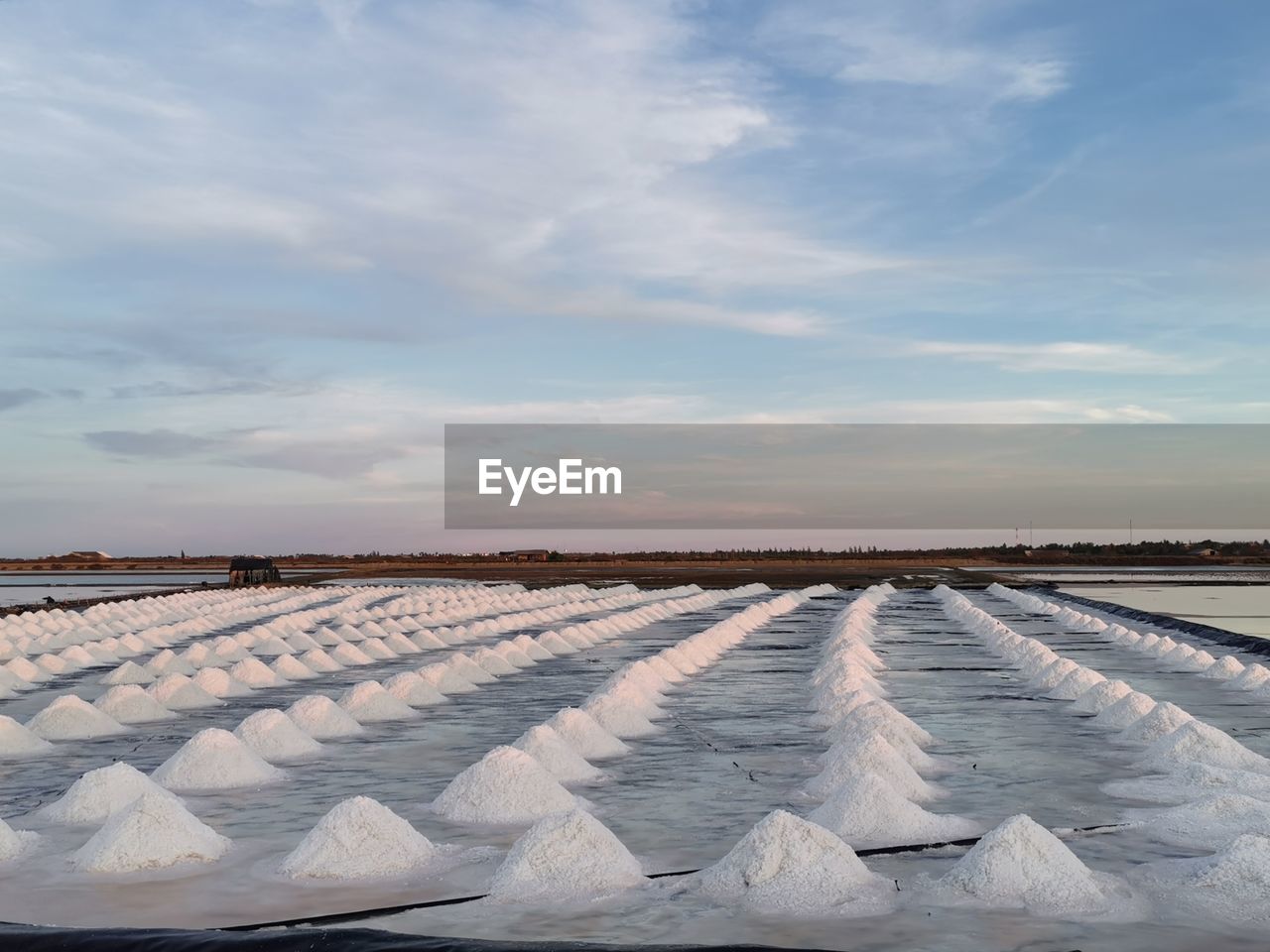 SNOW COVERED LAND AGAINST SKY