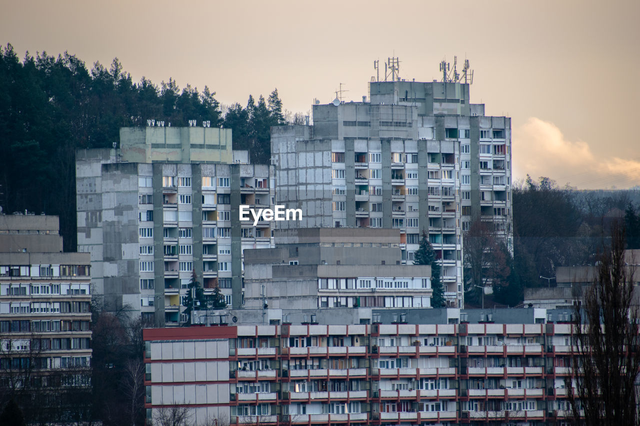 Buildings in city against sky