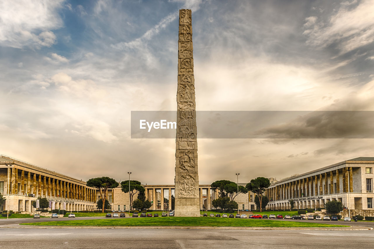 Marconi obelisk against cloudy sky during sunset