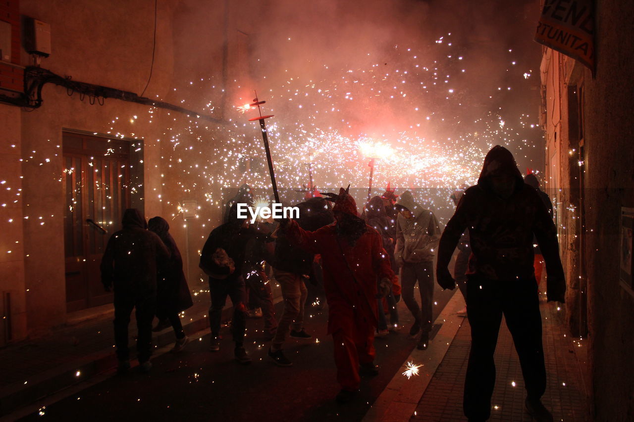 Correfoc parties, typical with firecrackers and lights in the towns