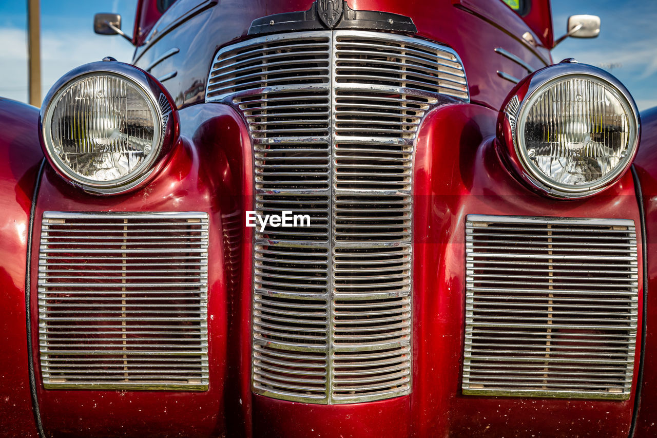 CLOSE-UP OF VINTAGE CAR PARKED