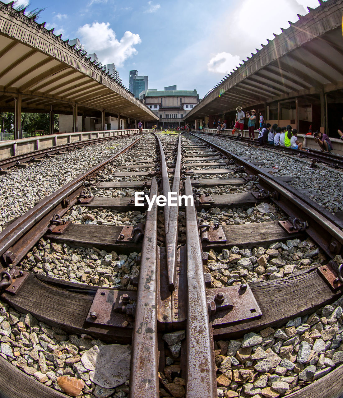 RAILROAD TRACKS AGAINST SKY