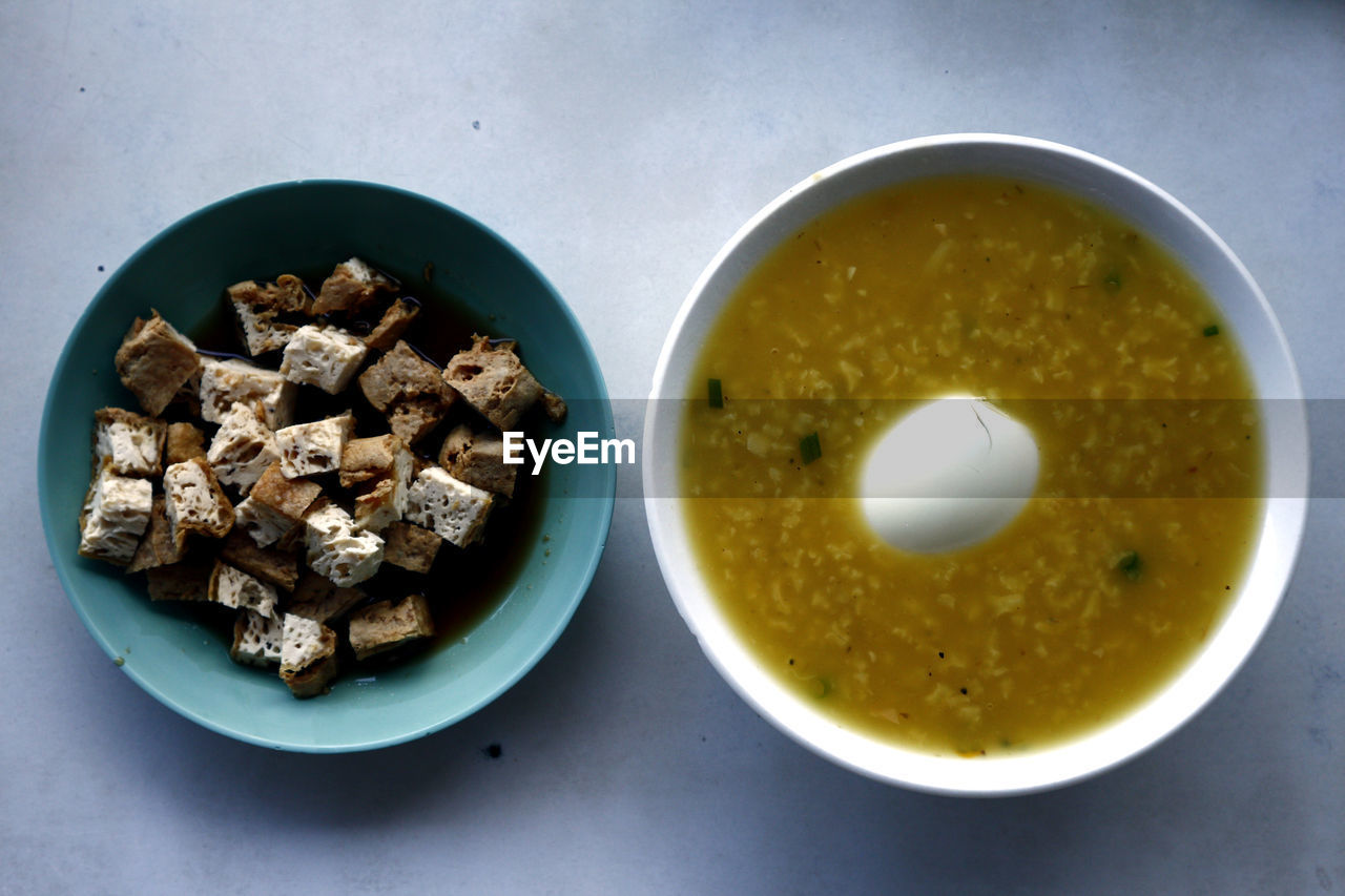 Directly above shot of food in bowls on table