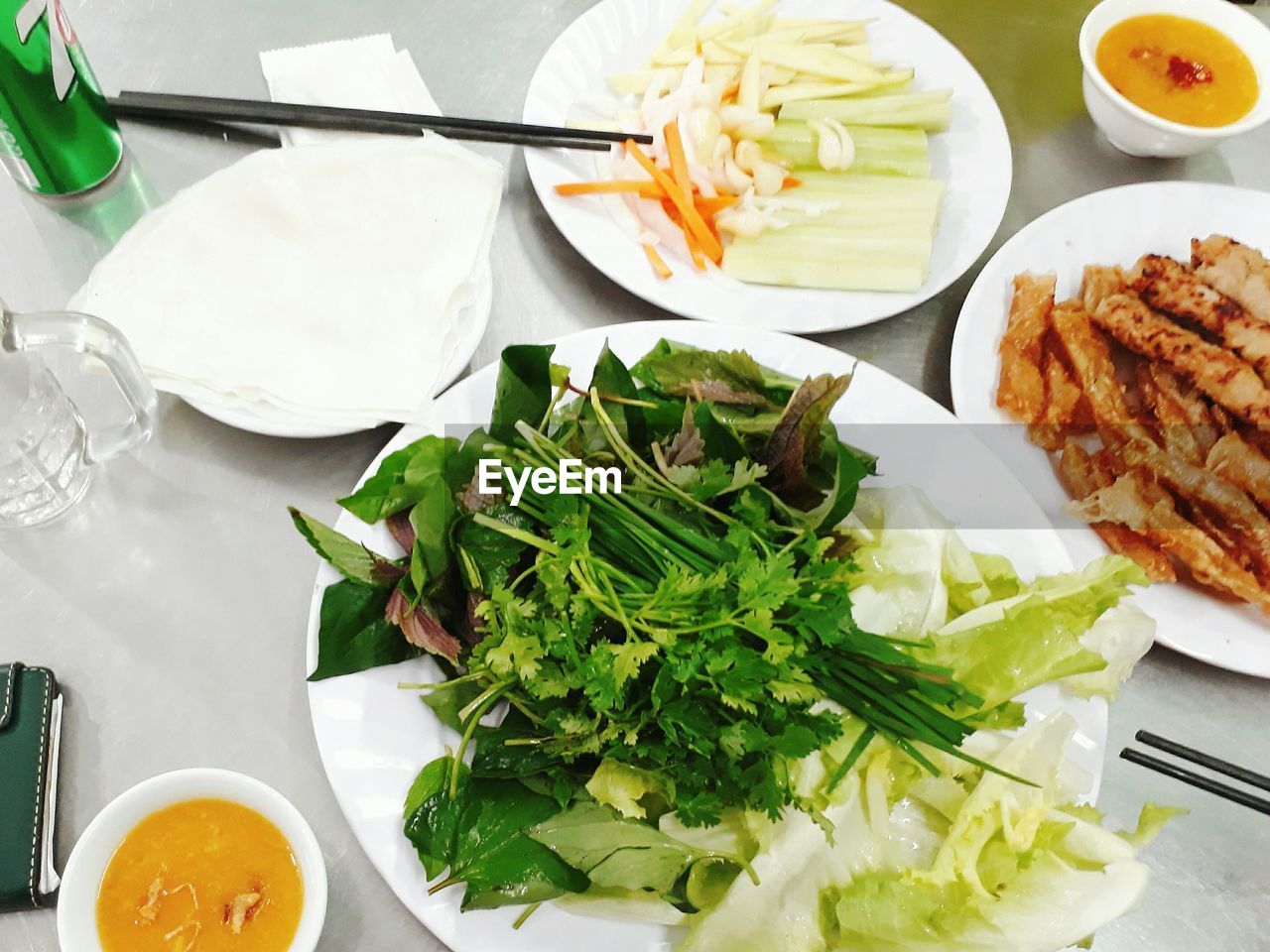 High angle view of food served in plates on table