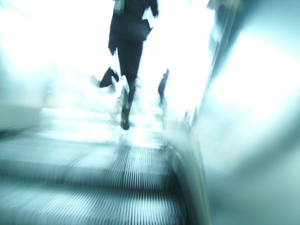 BLURRED MOTION OF WOMAN