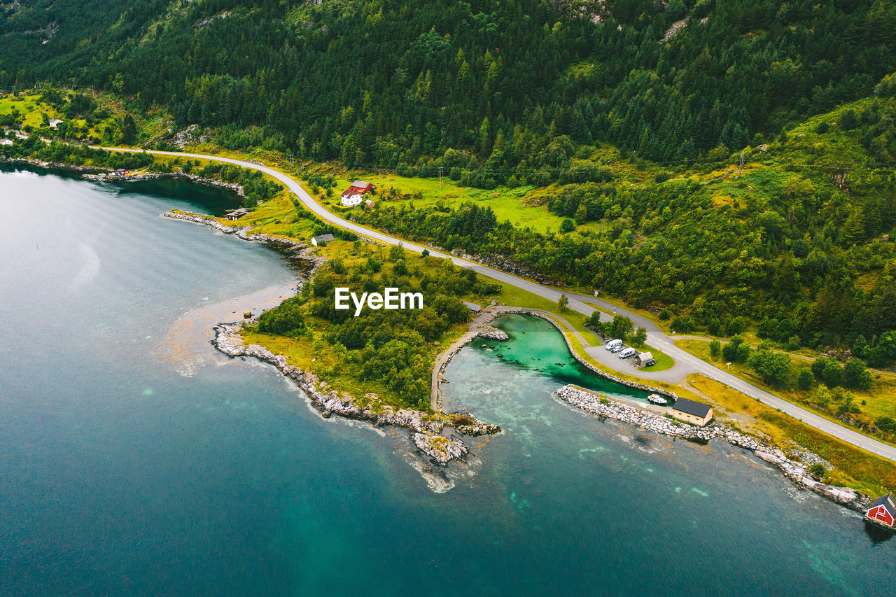 Aerial view of field by sea