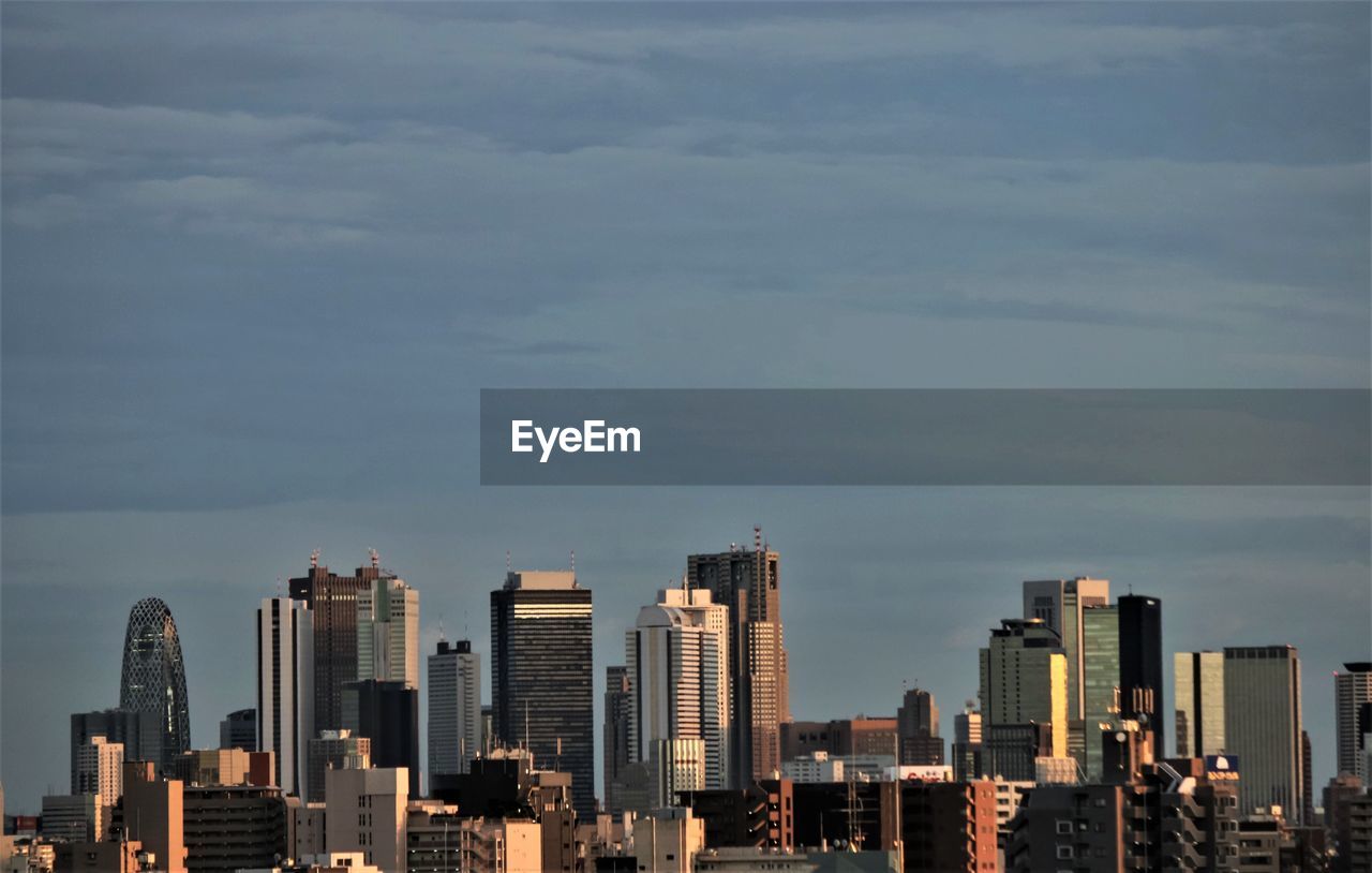 Modern cityscape against sky