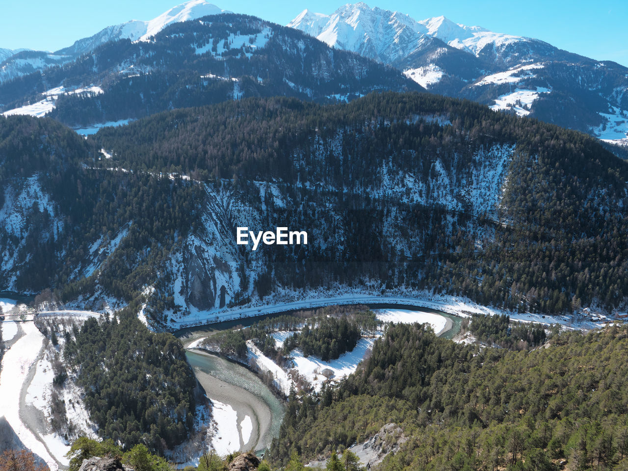 SCENIC VIEW OF MOUNTAINS AGAINST SKY DURING WINTER