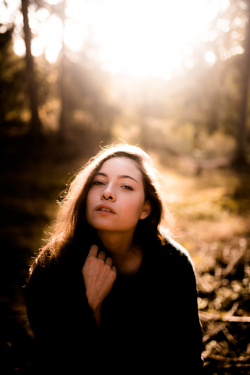 Portrait of young woman with long hair