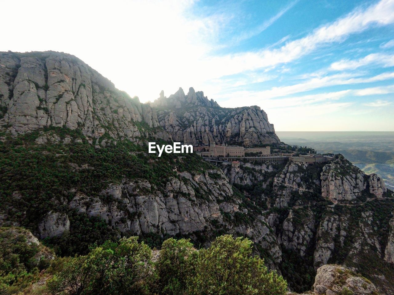 Scenic view of rocky mountains against sky