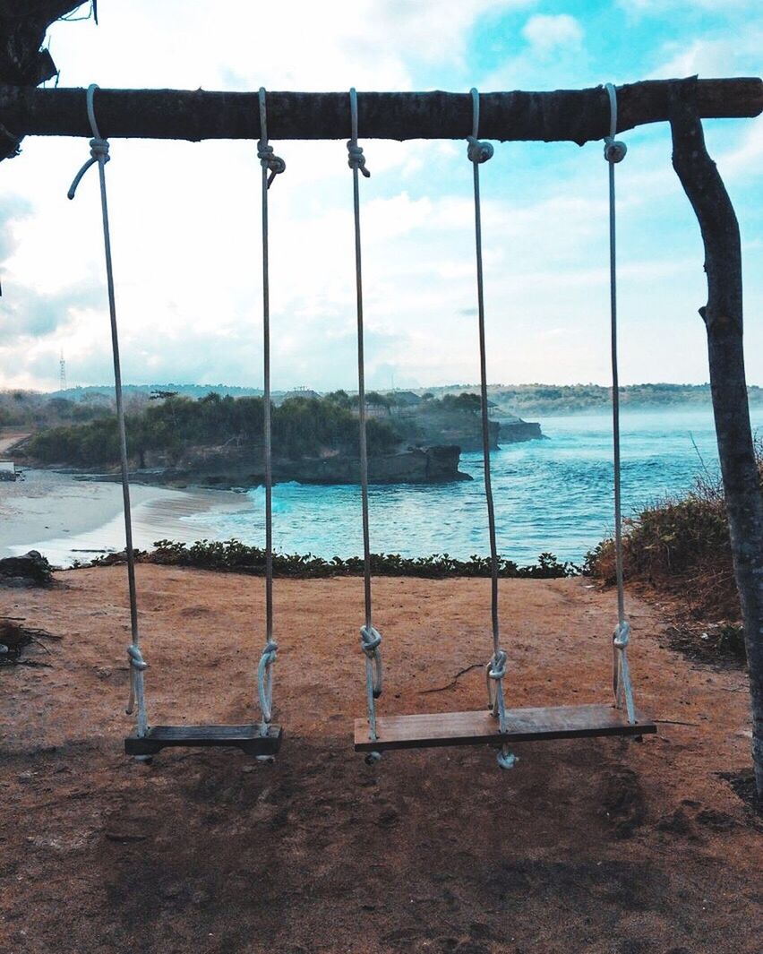 VIEW OF SWING AGAINST SEA