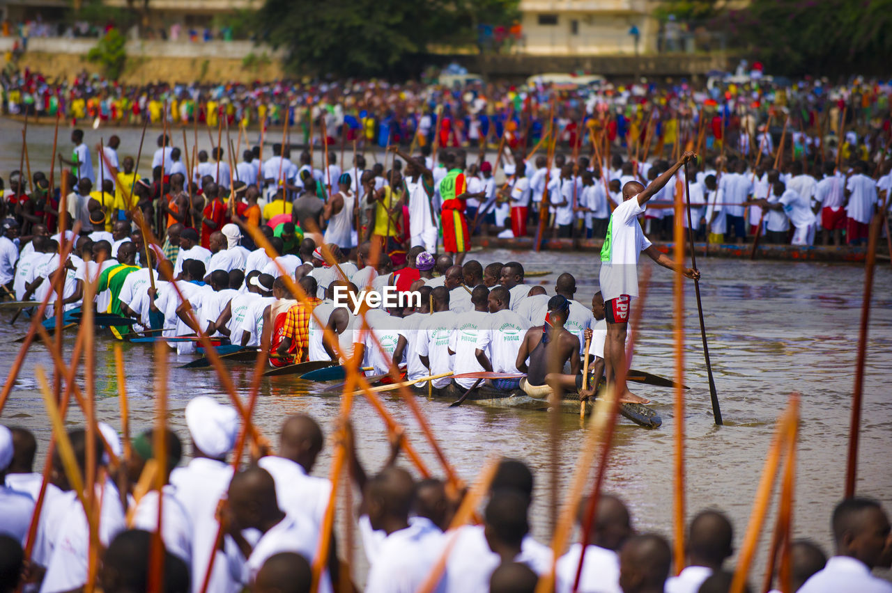 GROUP OF PEOPLE IN RIVER