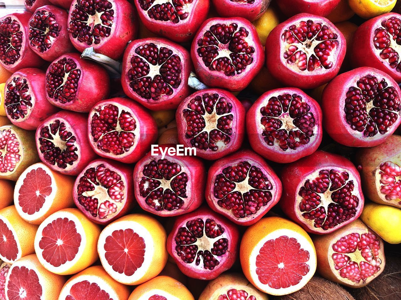 Pomegranate orange lemon grapefruit fruit juice red yellow pink