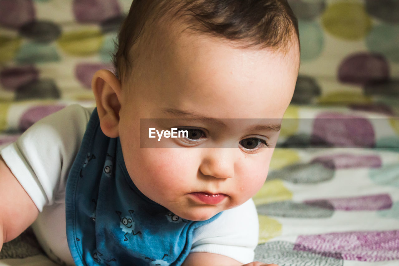 Close-up of cute boy at home