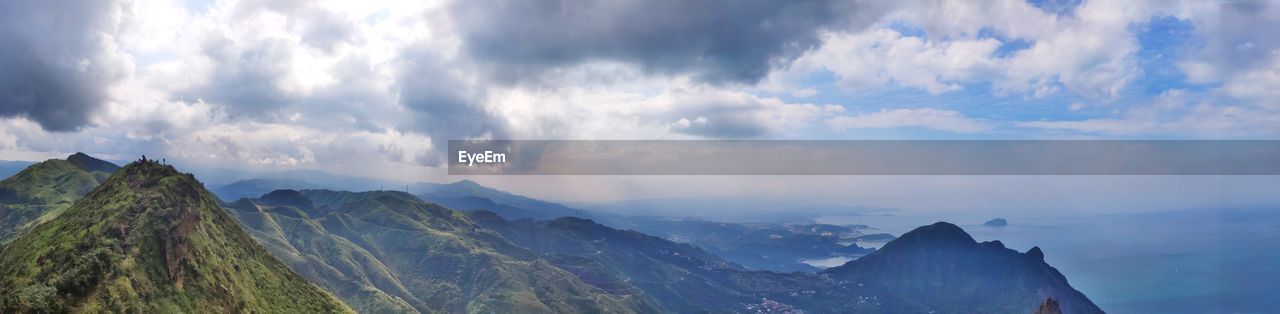 Panoramic view of majestic mountains against sky