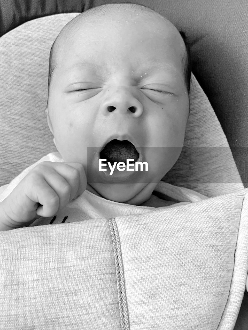 baby, child, person, childhood, one person, mouth open, black and white, portrait, indoors, human mouth, human face, innocence, emotion, cute, monochrome photography, beginnings, lying down, yawning, babyhood, relaxation, toddler, eyes closed, facial expression, portrait photography, front view, monochrome, headshot, nose, furniture, high angle view, shouting, lifestyles, close-up, baby clothing, crying, newborn, laughing, lying on back