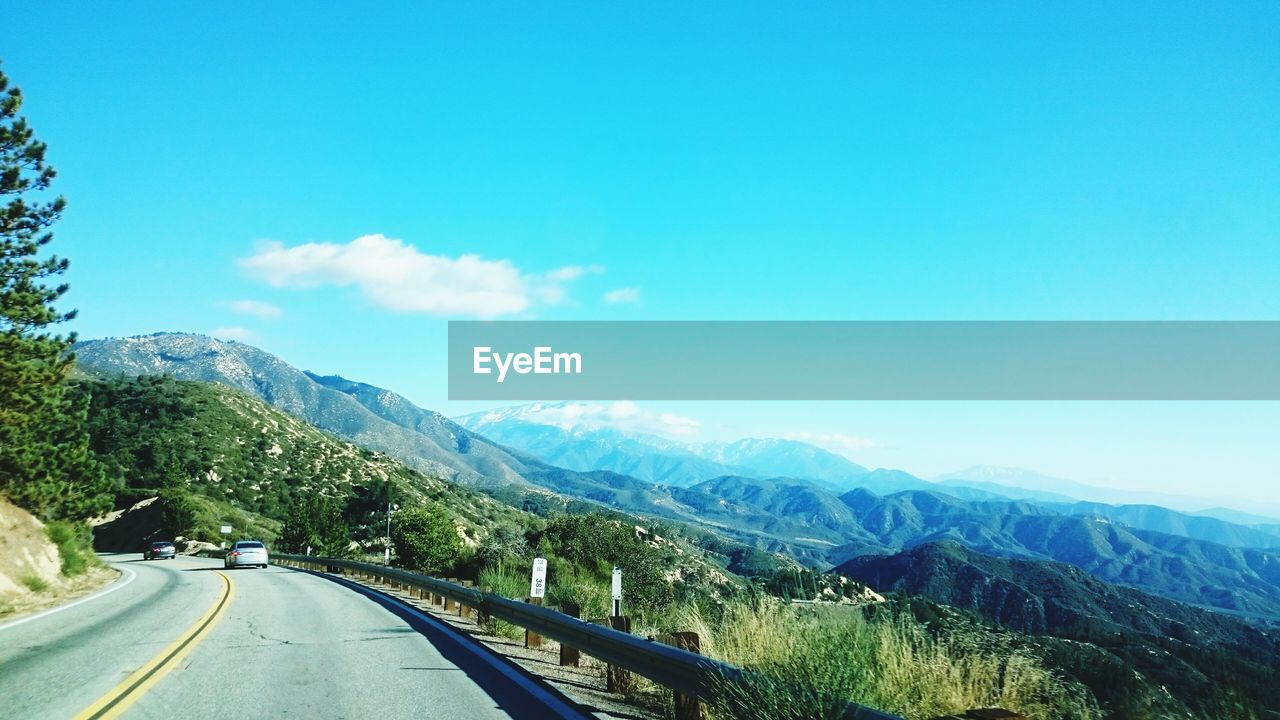 View of country road against clear sky