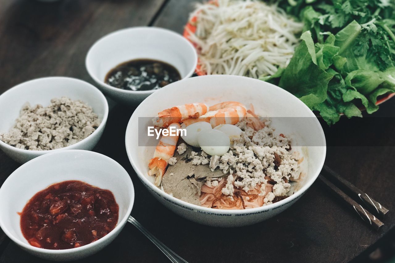 High angle view of hu tieu noodle soup ingredients