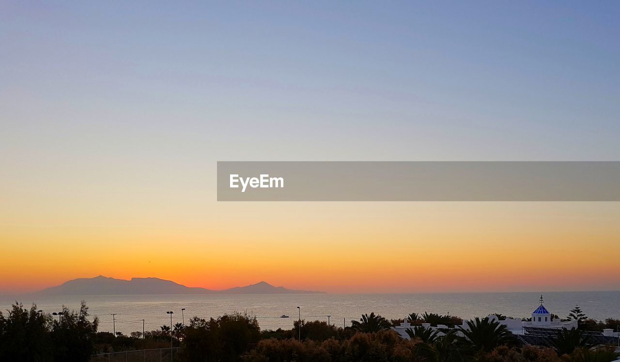 Scenic view of sea during sunset