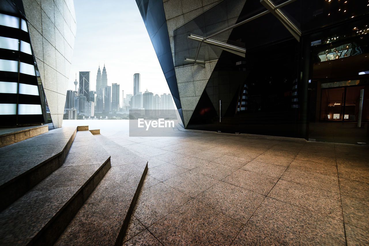 Modern cityscape against sky