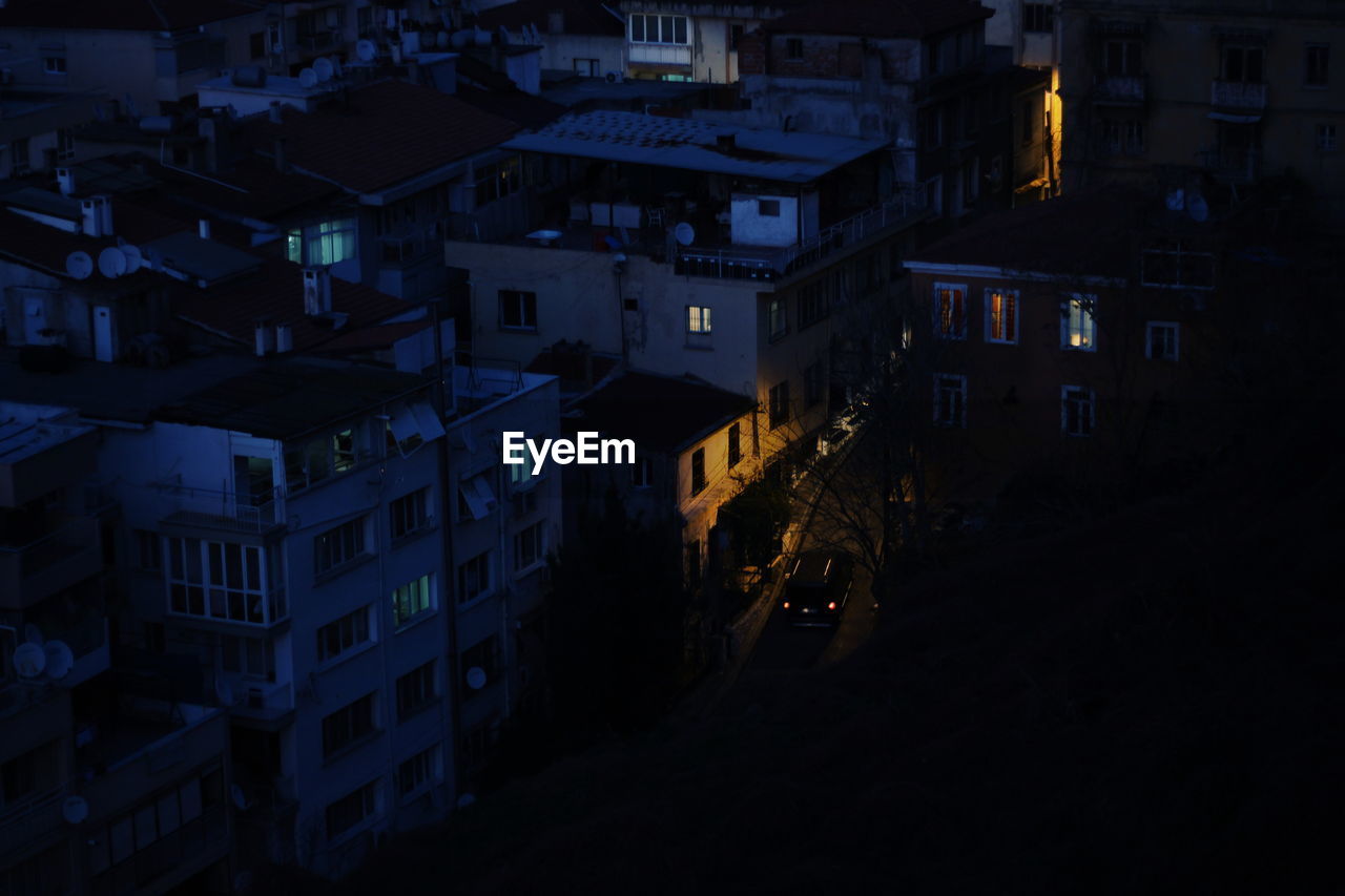 High angle view of illuminated buildings at night