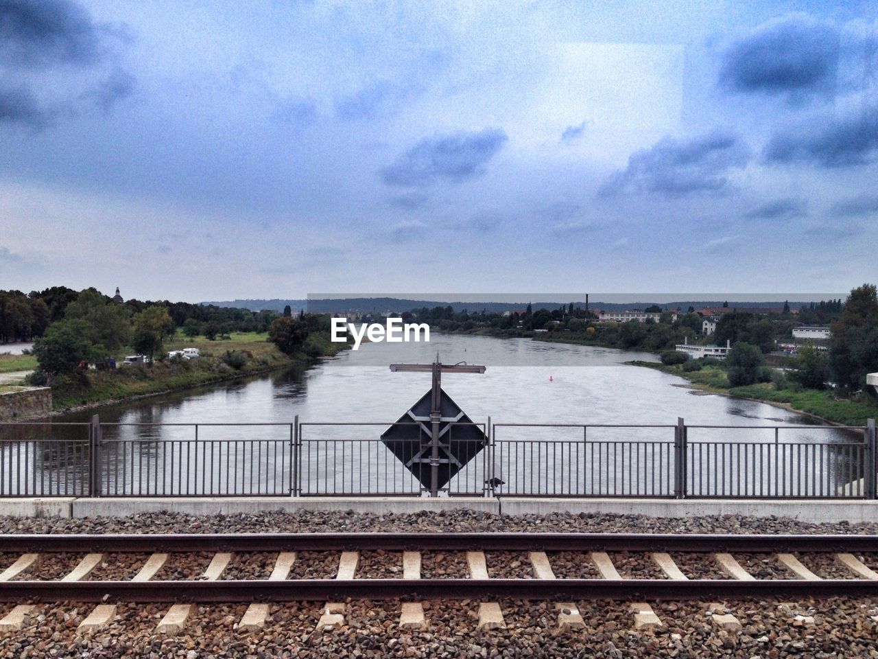 River against sky seen from railroad tracks