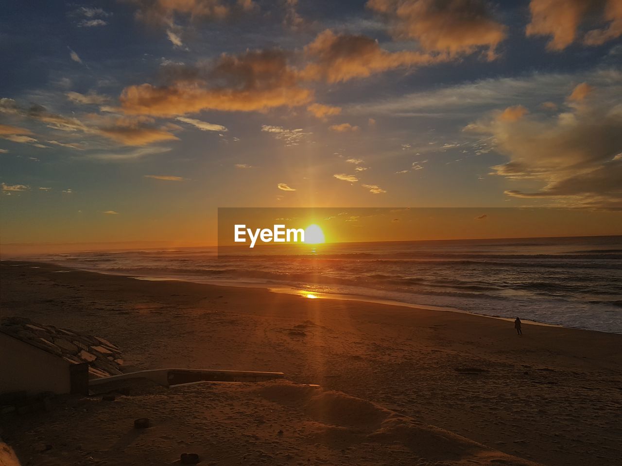 View of beach at sunset