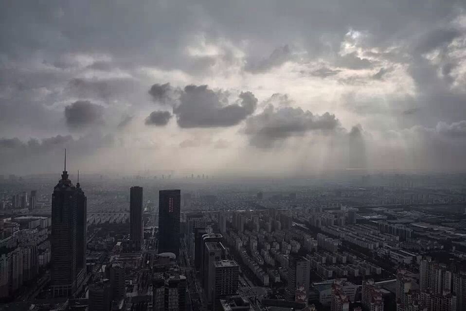 Aerial view of city at sunset