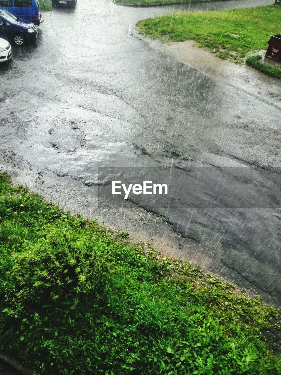 VIEW OF CAR ON ROAD