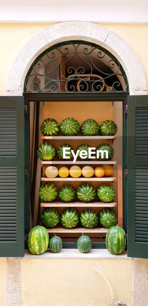 Close-up of fruits on glass window