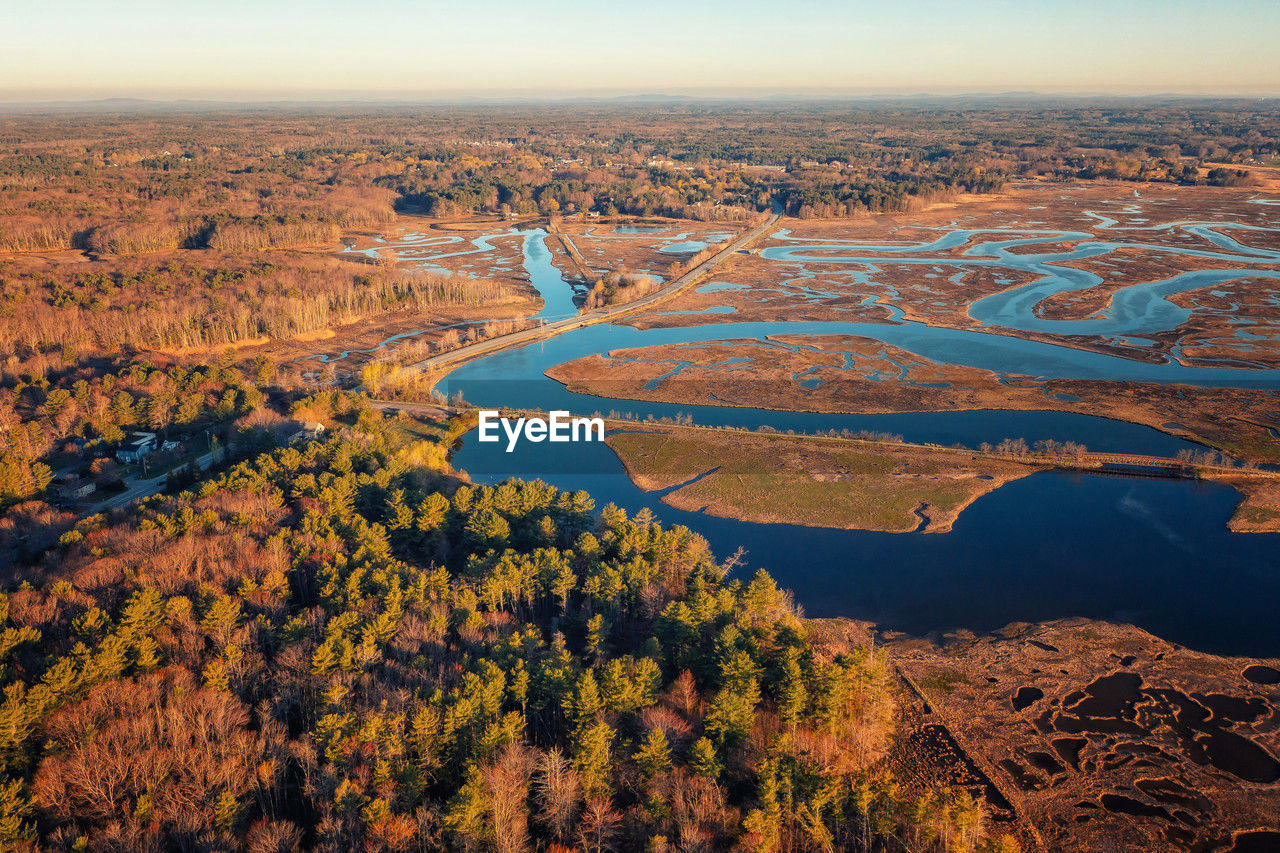 Autumn drone photo of scarborough park, usa. top view of autumn trees, with road and small ponds