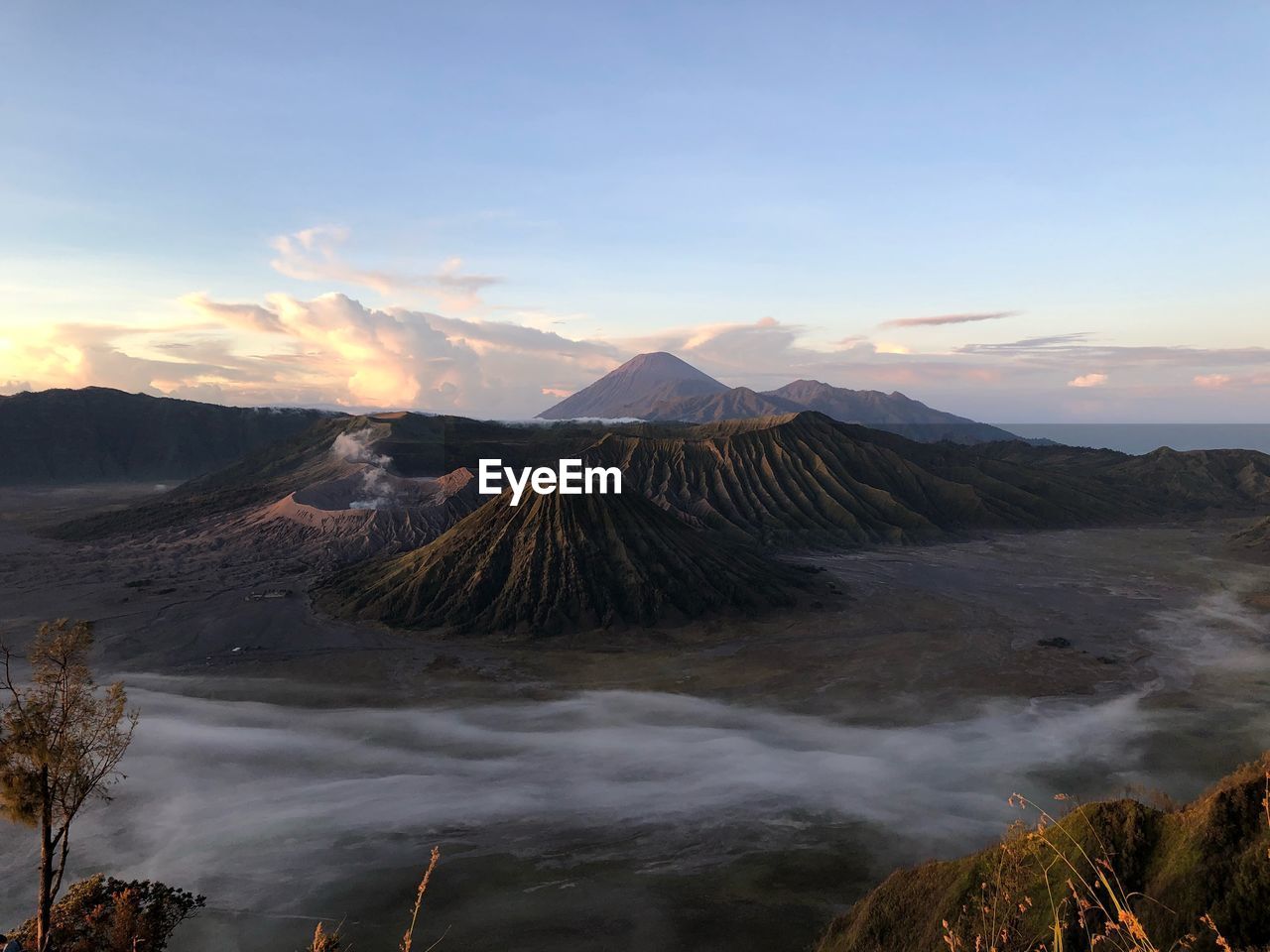 Volcanic landscape against sky