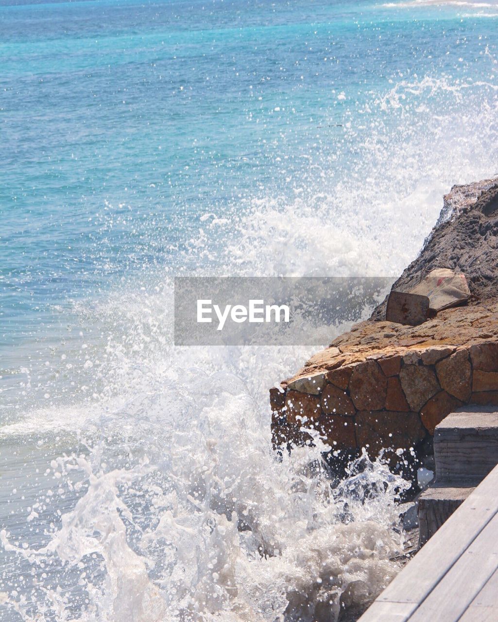 Waves splashing on rocks