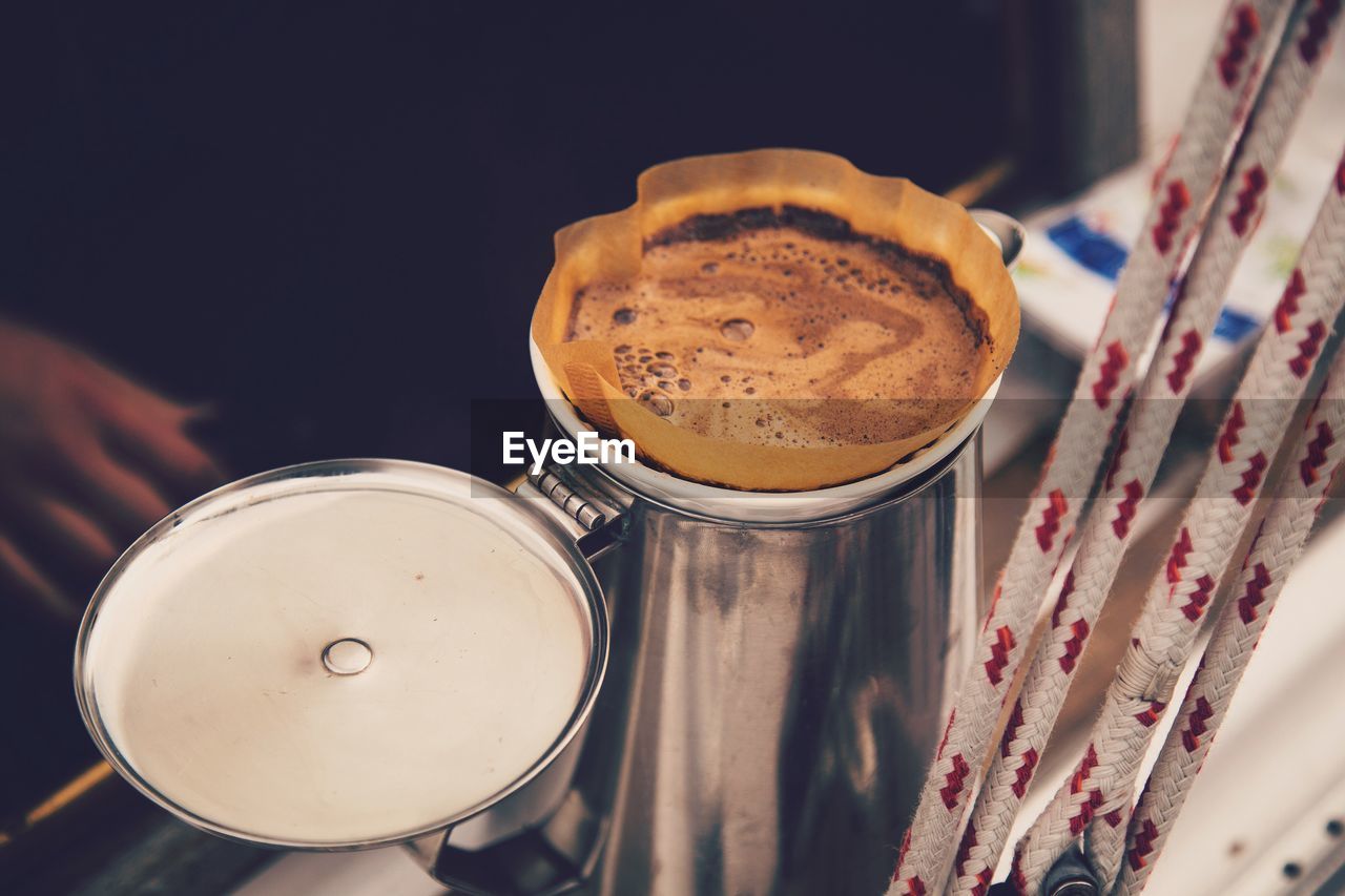 High angle view of coffee in metal jug