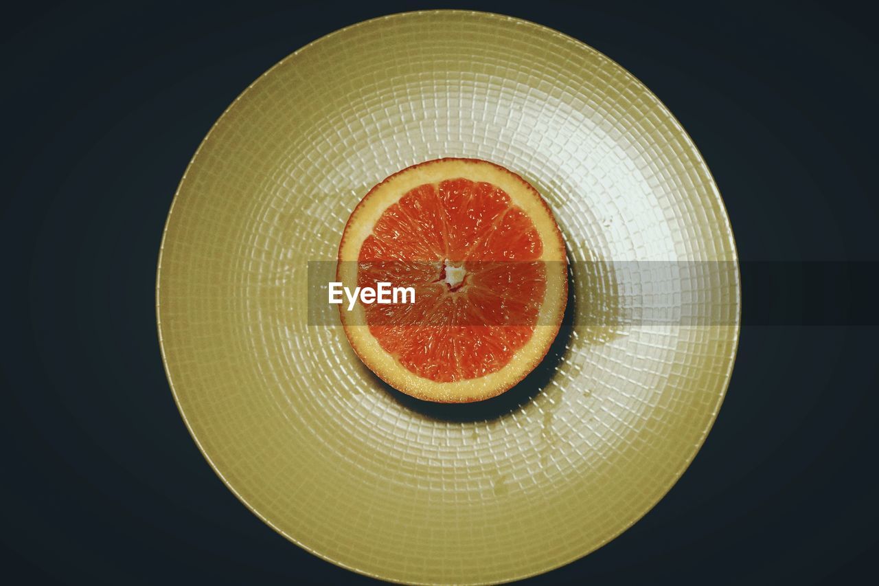 High angle view of orange fruit on table