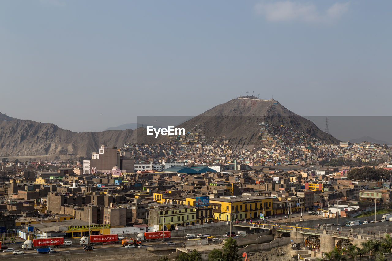 aerial view of townscape against sky