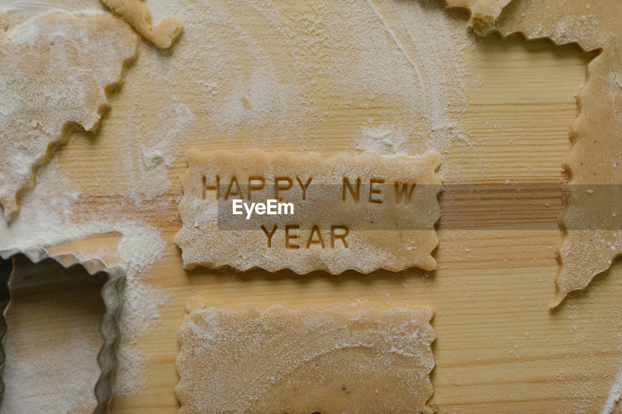 Happy new year written on a cookie