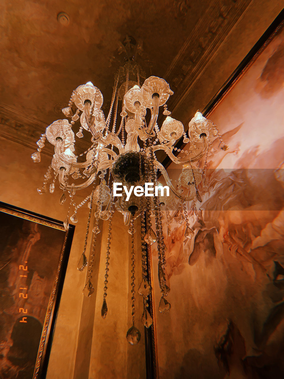 chandelier, lighting, low angle view, light, architecture, ceiling, indoors, lighting equipment, light fixture, no people, illuminated, decoration, built structure, hanging, travel destinations, wealth