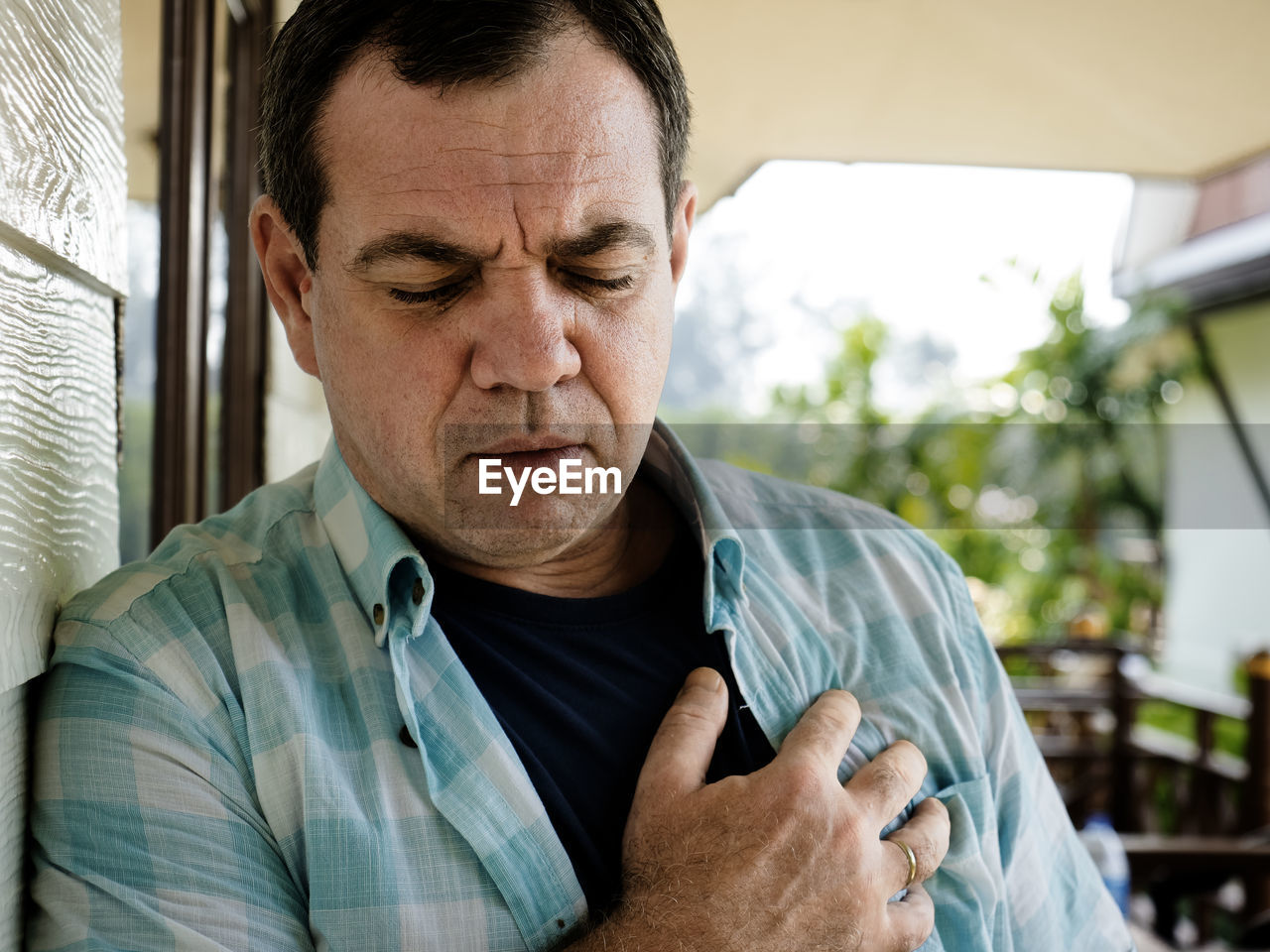 Mature man suffering from chest pain