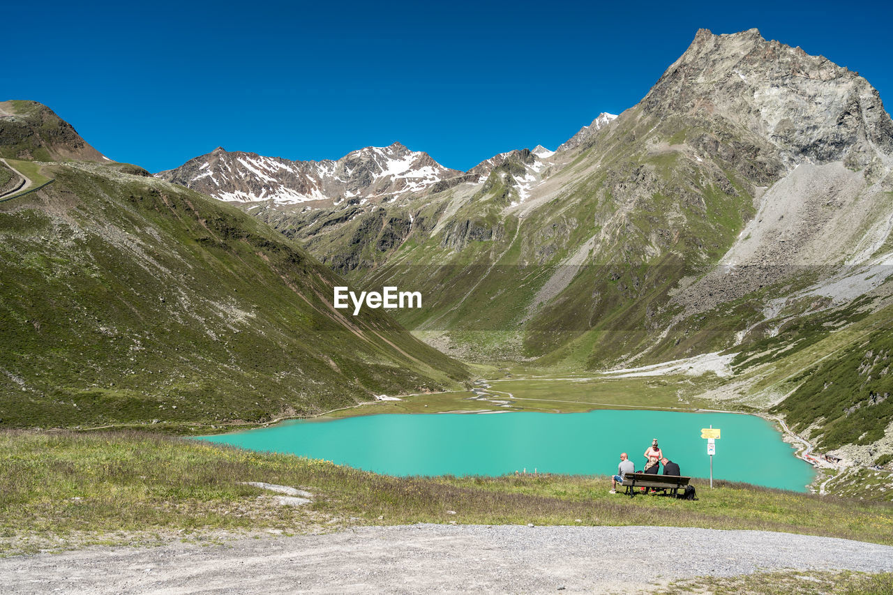 SCENIC VIEW OF MOUNTAINS AGAINST SKY DURING WINTER